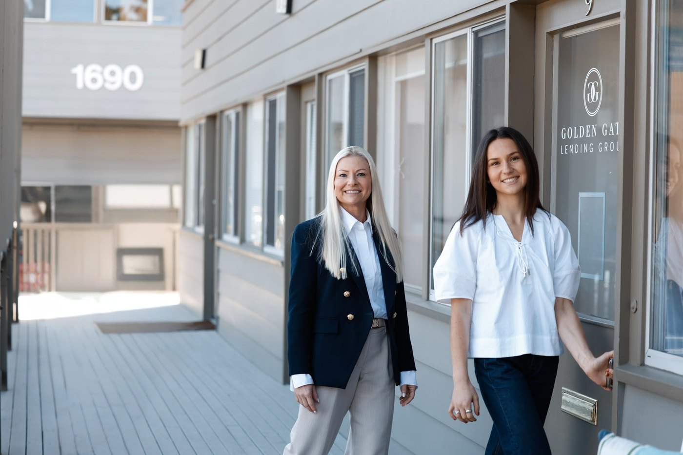 Sofia Nadjibi and Emma Murphy outside the Golden Gate Lending Group office in Corte Madera